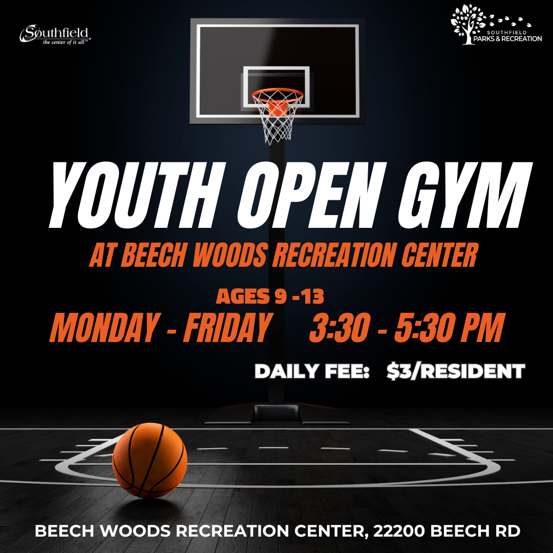 photo of a basketball on the floor at the top of the key facing a basketball net with a black background