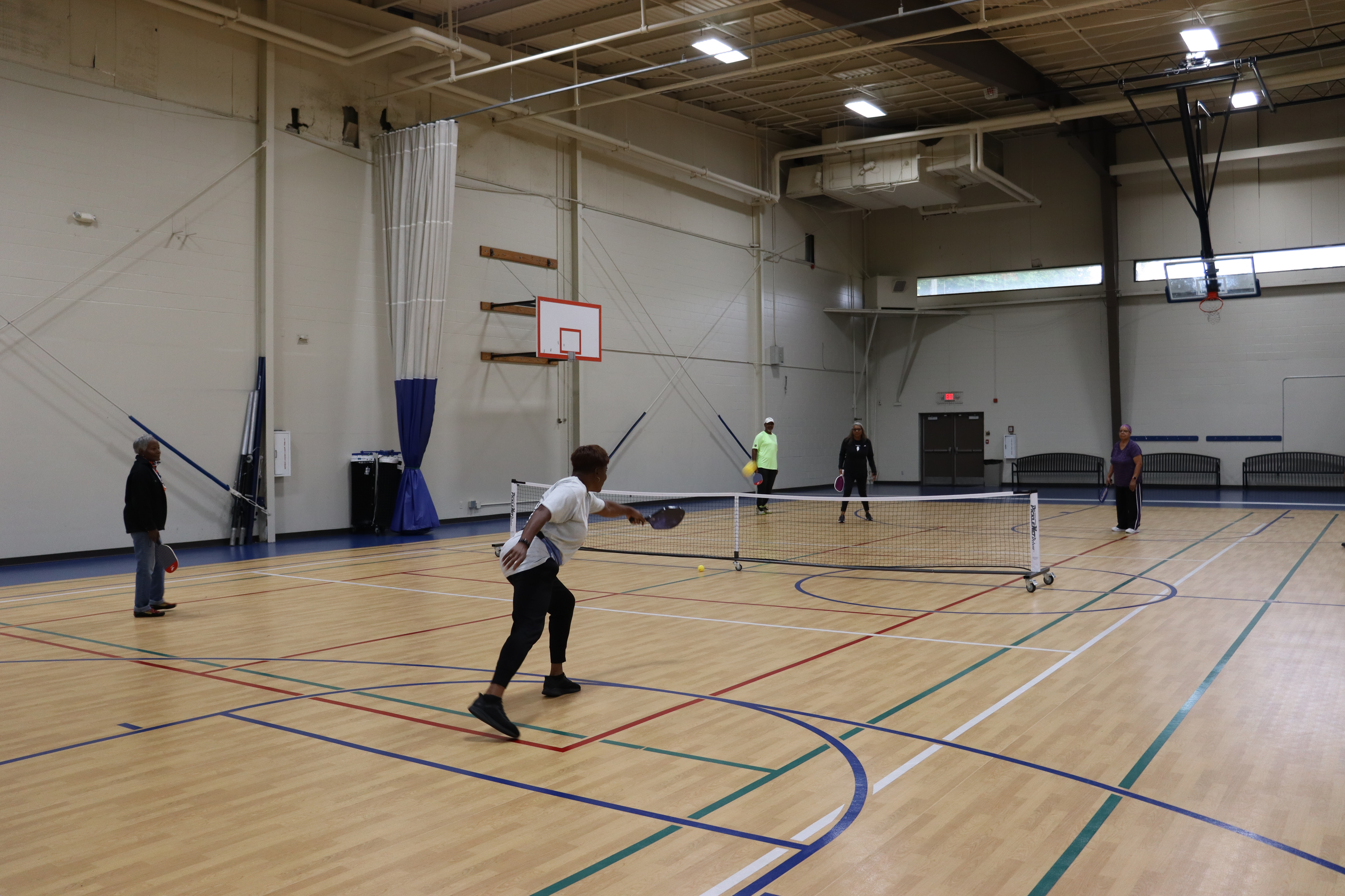 photo of senior adults playing pickleball inside the Beech Woods Recreation Center gym